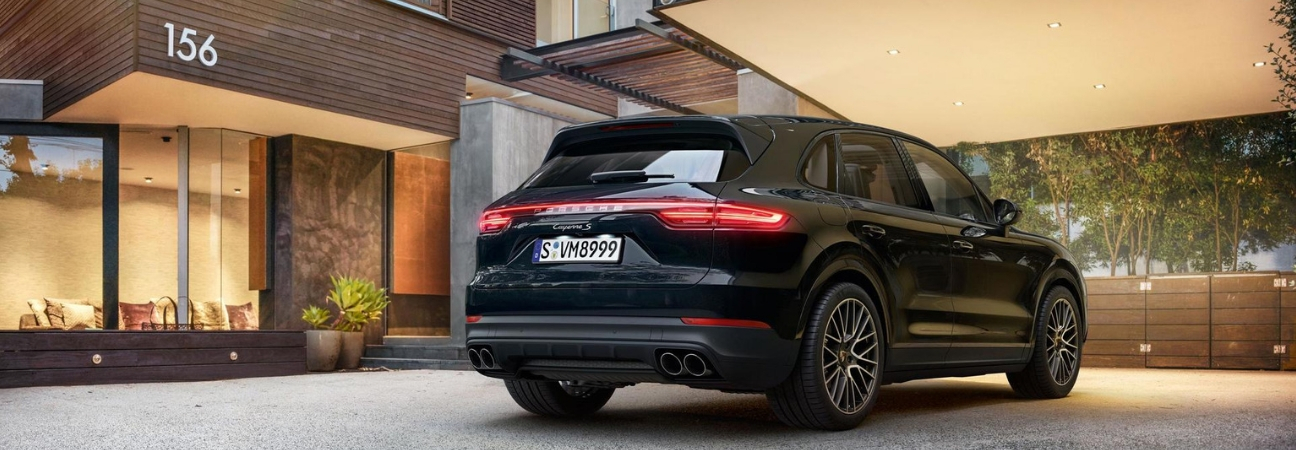 Black 2019 Porsche Cayenne parked in driveway